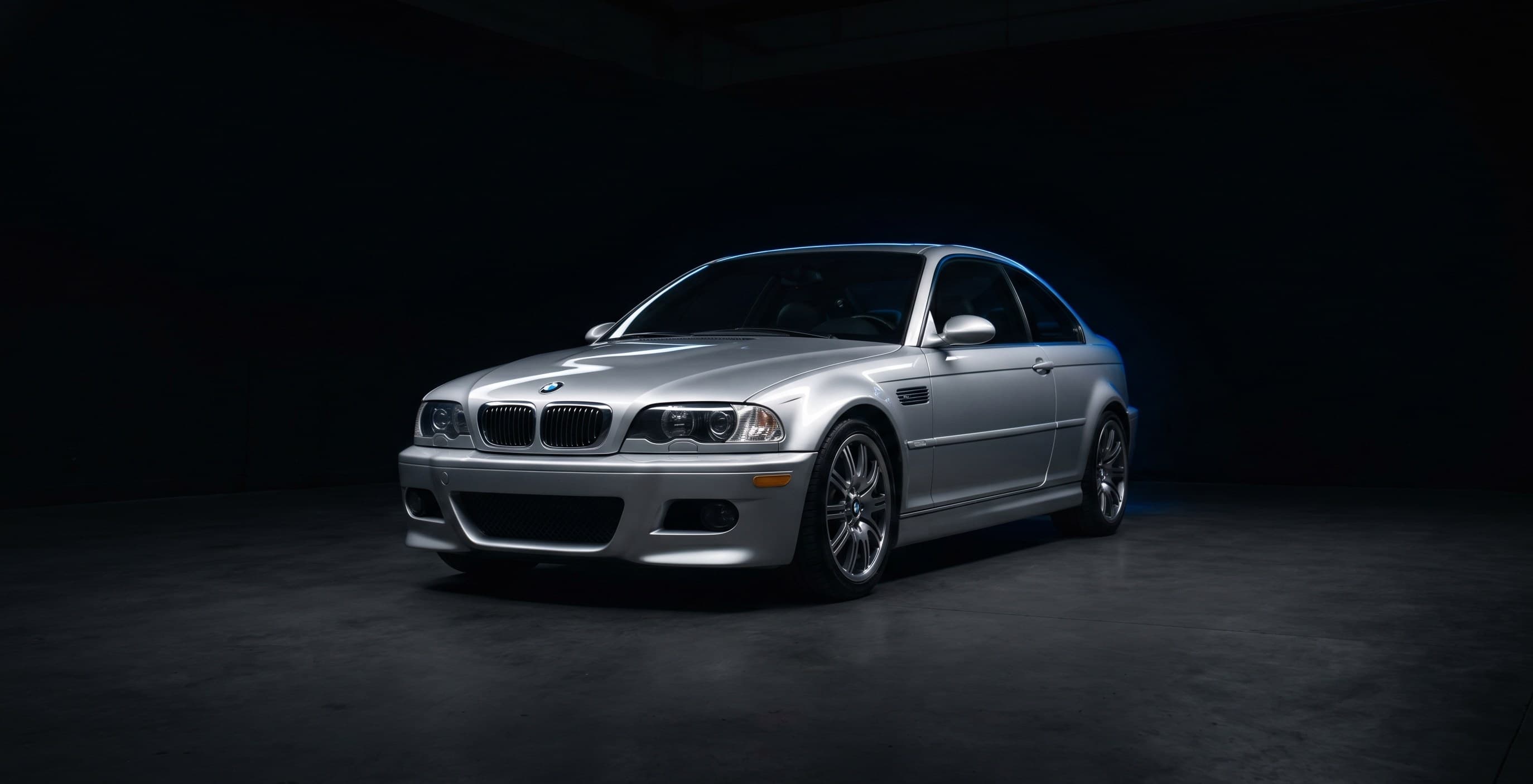 Premium car in dark studio